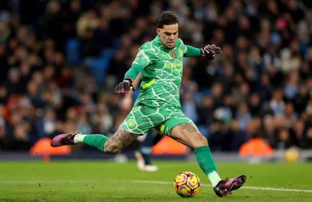 Ederson clears a ball