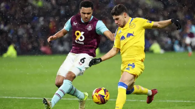 Leeds Manor Salomon takes on Burnley defender CJ Egan Riley