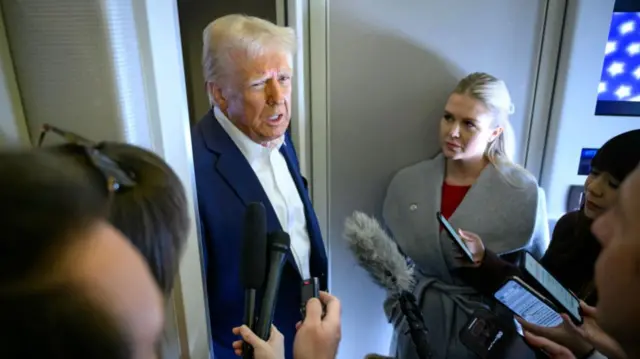 Donald Trump speaks to reporters