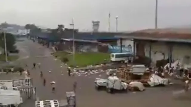 Screengrab of video of people looting near Goma airport building