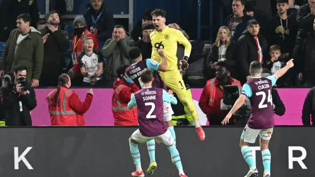 Burnley goalkeeper James Trafford celebrates with his team-mates