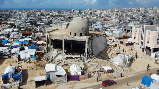 An aerial view of tents near a bombed mosque in Khan Younis