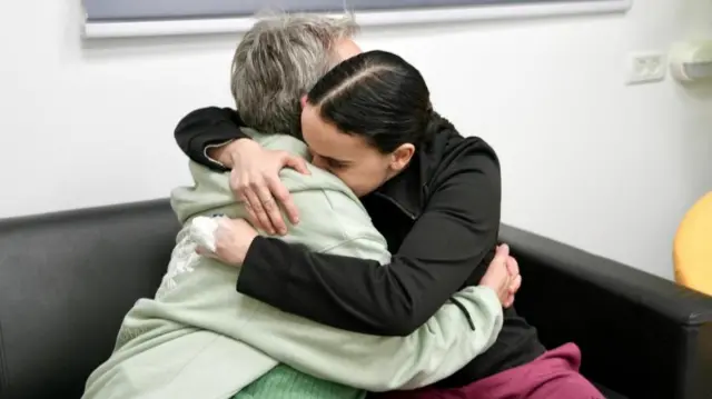 Israel-UK dual national Emily Damari, pictured with her mother after being released