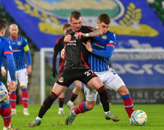 Stewart Nixon of crusaders and Ethan McGee of Linfield