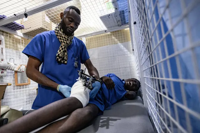 A victim of fighting between the M23 rebels and the Armed forces of the Democratic Republic of Congo (FARDC) is attended to in Cbeca Ndosho hospital in Goma, North Kivu province.