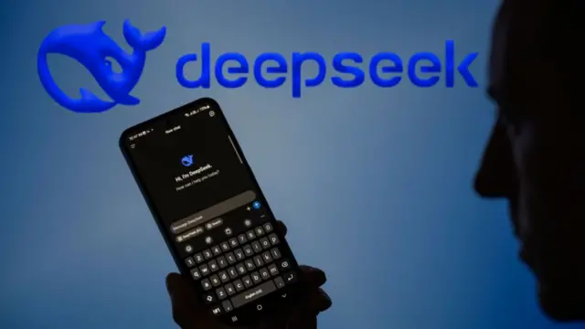 The Deepseek chatbot app is displayed on a mobile phone in the background in this photo illustration in Brussels, Belgium, on January 28, 2025