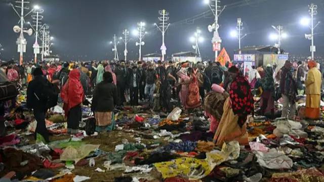 Devotees are pictured at the site of crush amid the ongoing Maha Kumbh Mela festival in Prayagraj