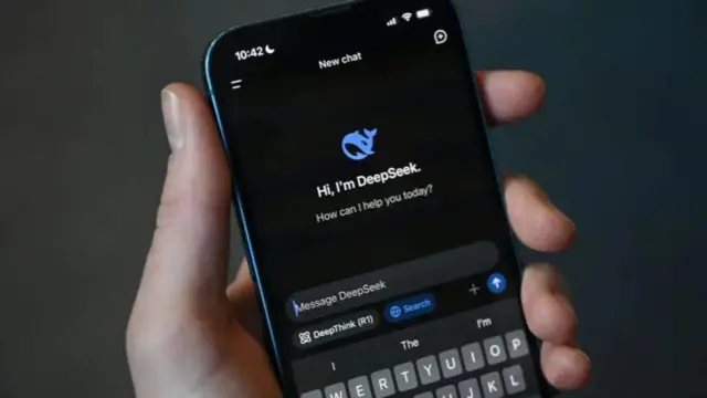 Smartphone with DeepSeek app open, with words: "Hi, I'm DeepSeek. How can I help you today?"