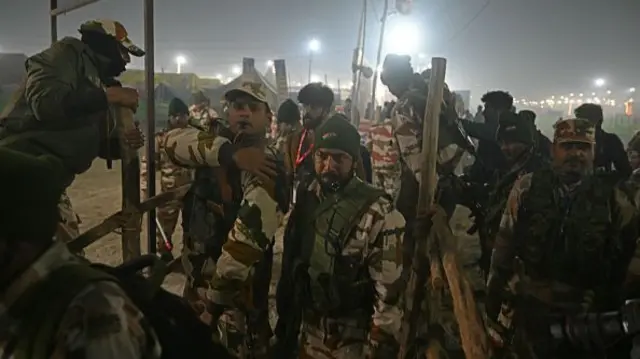 Security personnel arrive at the site of crush amid the ongoing Maha Kumbh Mela festival in Prayagraj