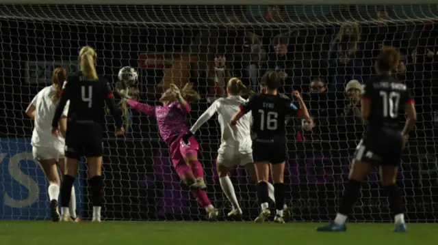 Frida Maanum of Arsenal scores her team's second goal as Jackie Burns of Bristol City fails to make a save during The Adobe Women's FA Cup Fourth Round match between Arsenal and Bristol City