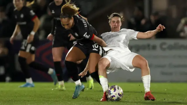 Mariona Caldentey of Arsenal is challenged by Lexi Lloyd-Smith of Bristol City during The Adobe Women's FA Cup Fourth Round match between Arsenal and Bristol City