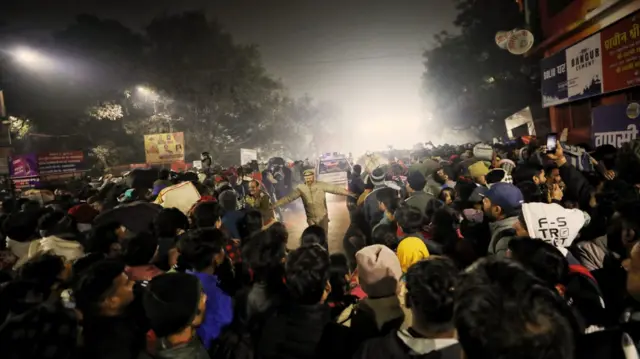 Police officials trying to manage the crowd