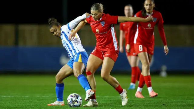 Nikita Parris of Brighton & Hove Albion is challenged by Becky Salicki of Durham during The Adobe Women's FA Cup Fourth Round match between Brighton & Hove Albion and Durham