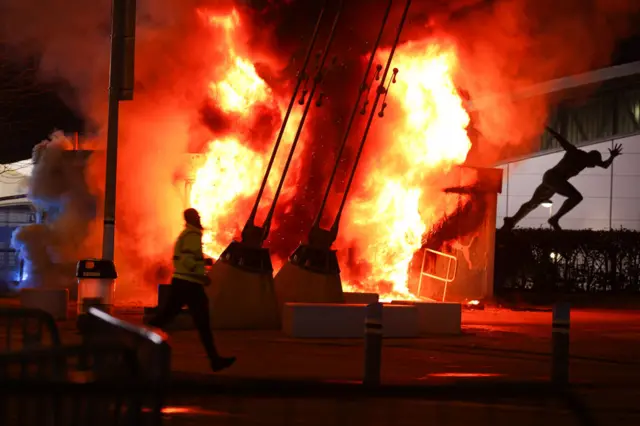 Fire outside the Etihad Stadium.