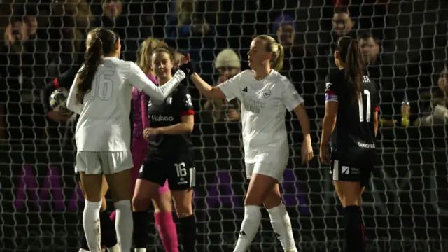 Beth Mead of Arsenal celebrates scoring her team's fourth goal with teammate Rosa Kafaji during The Adobe Women's FA Cup Fourth Round match between Arsenal and Bristol City