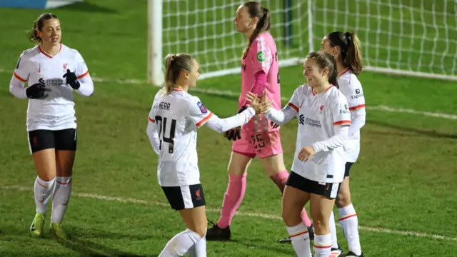 ucy Parry of Liverpool celebrates scoring her team's fourth goal with teammate Samantha Kerr during The Adobe Women's FA Cup Fourth Round match between West Ham United and Liverpool