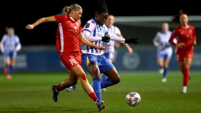 Michelle Agyemang of Brighton & Hove Albion battles for possession with Becky Salicki of Durham during The Adobe Women's FA Cup Fourth Round match between Brighton & Hove Albion and Durham