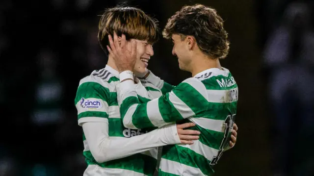 Celtic's Kyogo Furuhashi celebrates with Jota during a cinch Premiership match between Celtic and St Mirren at Celtic Park