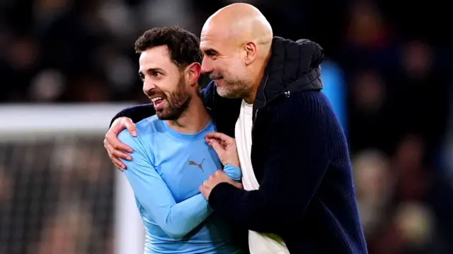 Pep Guardiola and Bernardo Silva