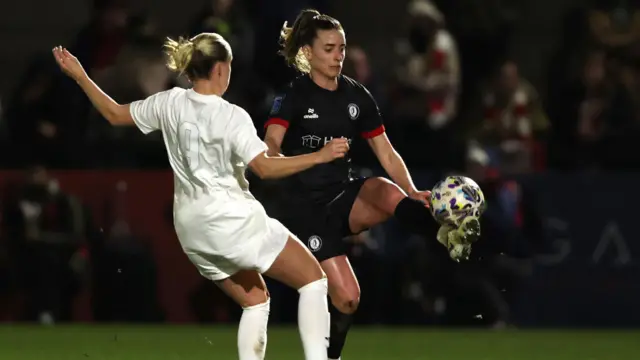 Chloe Mustaki of Bristol City controls the ball whilst under pressure from Beth Mead of Arsenal during The Adobe Women's FA Cup Fourth Round match between Arsenal and Bristol City