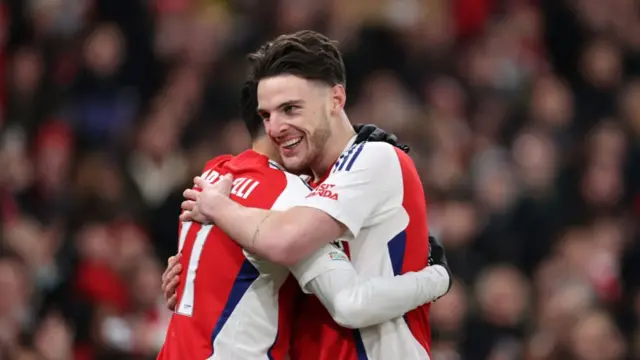 Declan Rice and Gabriel Martinelli hugging