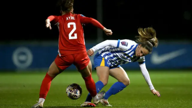 Marisa Olislagers of Brighton & Hove Albion battles for possession with Grace Ayre of Durham during The Adobe Women's FA Cup Fourth Round match between Brighton & Hove Albion and Durham