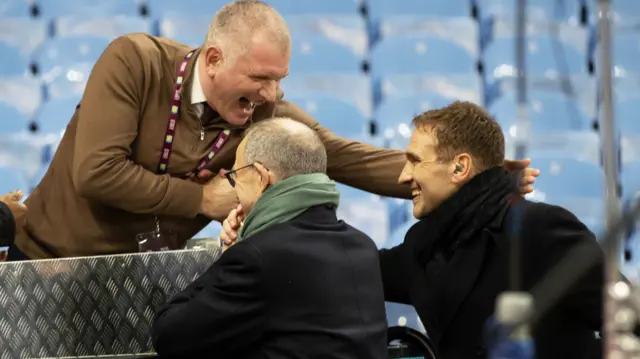 Former Celtic and Aston Villa Manager Martin O'Neill speaks with former players Tommy Johnson and Stiliyan Petrov during a UEFA Champions League 2024/25 League Phase MD8 match between Aston Villa and Celtic at Villa Park