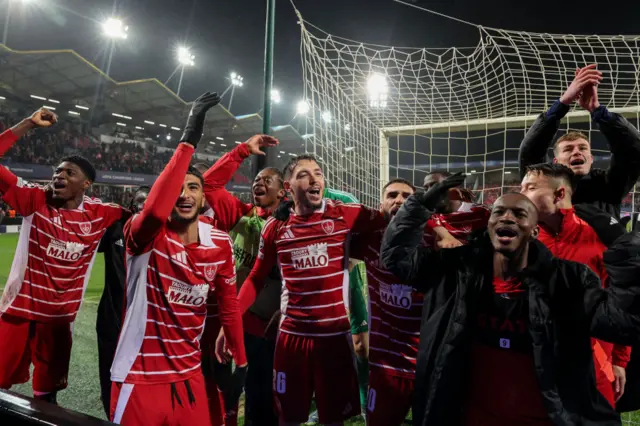 Brest team celebrating beating PSV