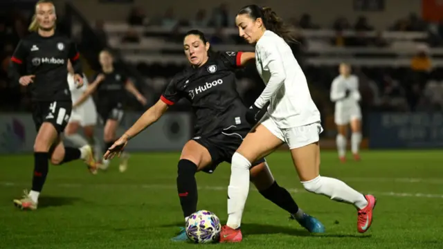 Rosa Kafaji of Arsenal is challenged by Harley Bennett of Bristol City during The Adobe Women's FA Cup Fourth Round match between Arsenal and Bristol City