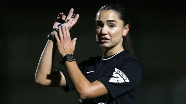 Match Referee Sophie Dennington indicates a hand ball during The Adobe Women's FA Cup Fourth Round match between Brighton & Hove Albion and Durham