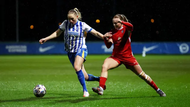 Pauline Bremer of Brighton & Hove Albion is challenged by Lily Crosthwaite of Durham during The Adobe Women's FA Cup Fourth Round match between Brighton & Hove Albion and Durham