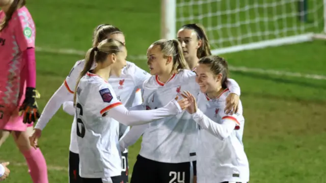 Lucy Parry of Liverpool celebrates scoring her team's fourth goal with teammates during The Adobe Women's FA Cup Fourth Round match between West Ham United and Liverpool