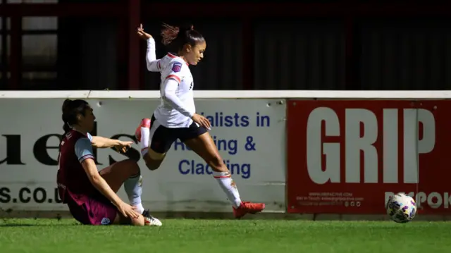 Taylor Hinds of Liverpool is challenged by Amber Tysiak of West Ham United resulting in a red card during The Adobe Women's FA Cup Fourth Round match between West Ham United and Liverpool