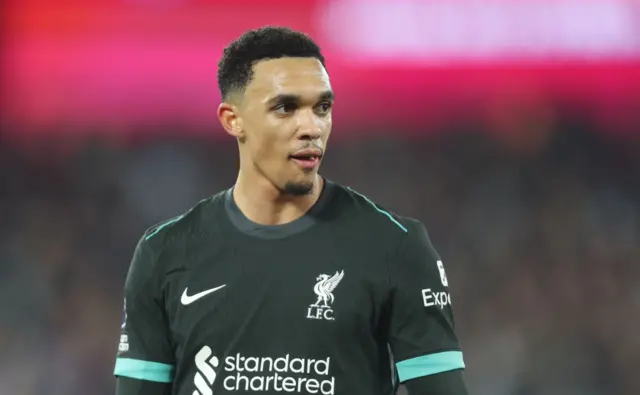 Trent Alexander-Arnold looking on