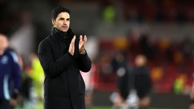 Arsenal manager Mikel Arteta applauds fans