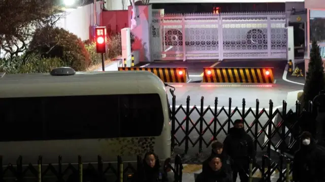 Buses block the entrance of the impeached South Korean President Yoon Suk Yeol's official residence