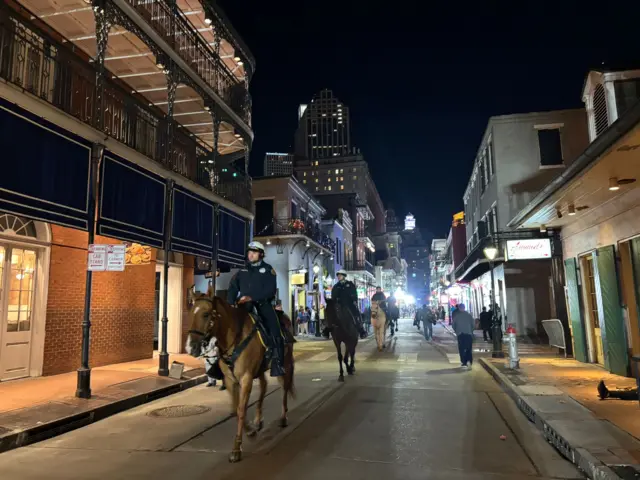 Law enforcement on horseback patrol Bourbon Street