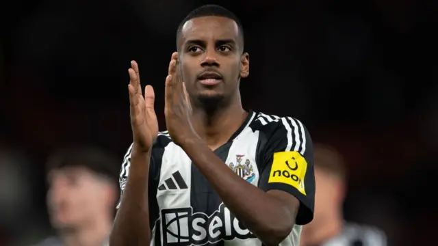 Newcastle striker Alexander Isak clapping his hands