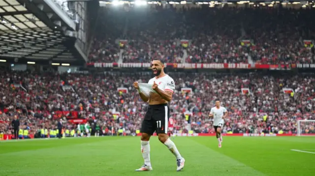 Liverpool's Mohamed Salah celebrates after scoring at Old Trafford