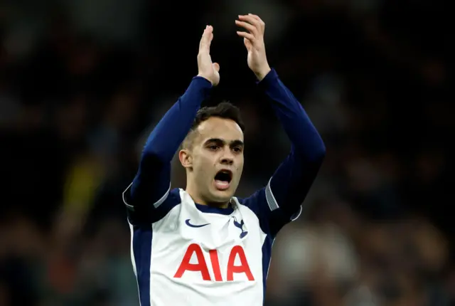 Sergio Reguilon applauding with his hands in the air