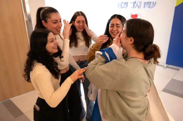 Agam Berger (right) with her fellow released hostages