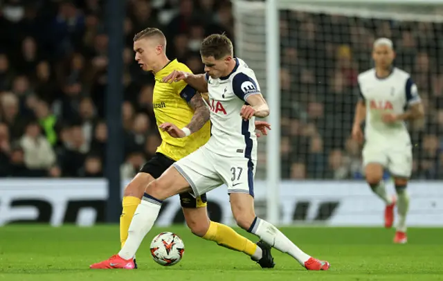 Micky van de Den battles for the ball