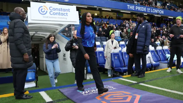 Naomi Girma of Chelsea walks on to the pitch prior to the Barclays Women's Super League match between Chelsea FC and Arsenal FC at Stamford Bridge