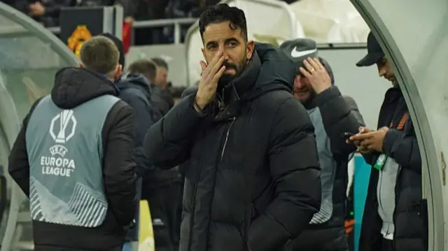 Manchester United Head Coach Rúben Amorim looks on