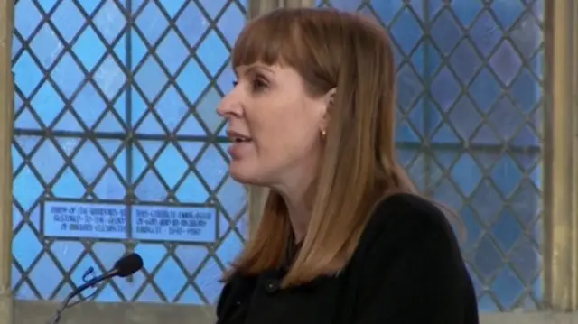 Angela Rayner in black dress and hair down deliver eulogy