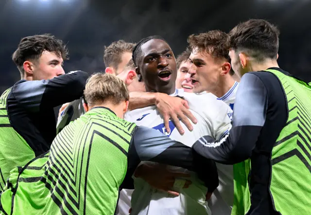 Hoffenheim's French forward David Ngabi Mokwa Ntusu (C) celebrates