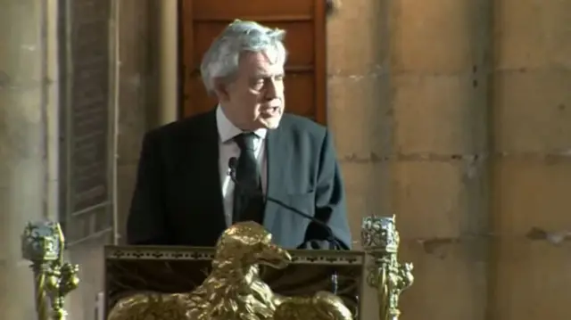 Gordon Brown on the pew delivering speech