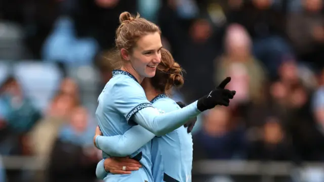 Vivianne Miedema of Manchester City celebrates scoring her team's third goal with Kerstin Casparij during The Adobe Women's FA Cup Fourth Round match between Manchester City and Ipswich Town