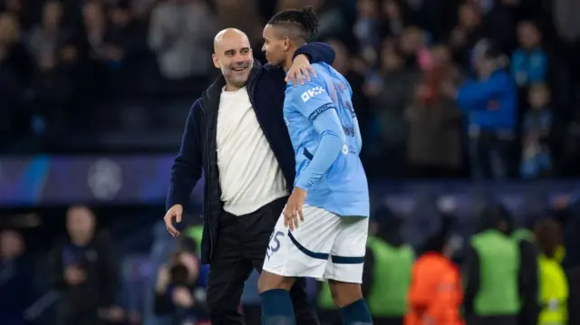 Pep Guardiola and Akanji after the victory over Club Brugge