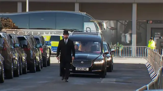 Hearse arriving at church